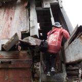 Tammy climbs up a wreck